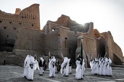 A traditional Saudi Ardah dance in front of Salwa Palace in At-Turaif in Ad Diriyah. Photo by Meshari Almuhanna / DGDA