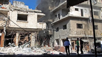 Smoke billows from a building following a reported bombardment by pro-Syrian government forces in the town of Maaret al-Numan in Syria's Idlib province, the country's last major opposition bastion. AFP
