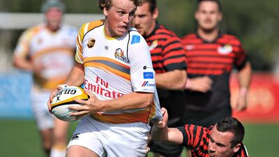 The Dubai Hurricanes (in white) are making an effort to get more Emiratis come through the ranks. Jeff Topping For The National