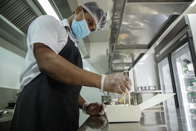Food is prepared in a Talabat cloud kitchen in the UAE. Photo: Talabat