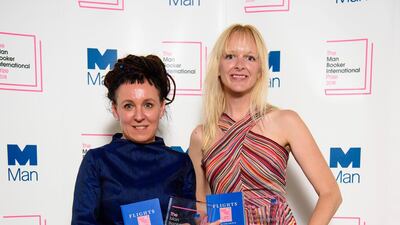 Polish author Olga Tokarczuk, left, with translator Jennifer Croft after winning the Man Booker International Prize 2018, for 'Flights', at the Victoria and Albert Museum in London. Matt Crossick / PA via AP