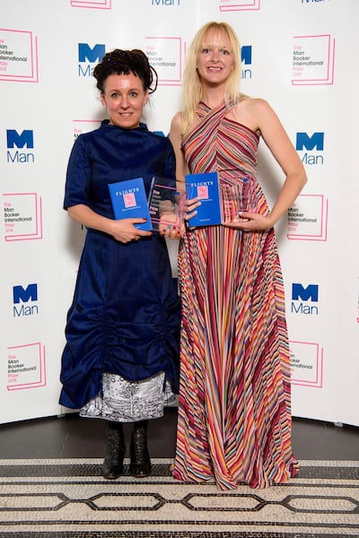 Polish author Olga Tokarczuk, left, with translator Jennifer Croft after winning the Man Booker International Prize 2018, for 'Flights', at the Victoria and Albert Museum in London. Matt Crossick / PA via AP