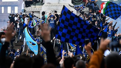 Inter Milan fans celebrate winning Serie A at the Piazza Castello. Reuters