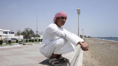 Gead Mohammed rests on the corniche wall while looking out at the ocean in an area of the Fujairah the municipality has slated for redevelopment. Antonie Robertson / The National