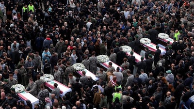 Mourning for the members of Lebanese state security forces who were killed in Israeli attacks on Nabatieh on Friday, in Sidon, Lebanon. Reuters