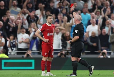 Liverpool's Diogo Jota is sent off by referee Simon Hooper during the Premier League match against Tottenham Hotspur. EPA