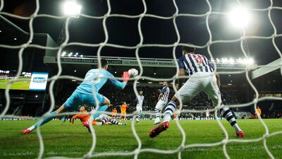 Newcastle United's Miguel Almiron scores their second goal. Reuters