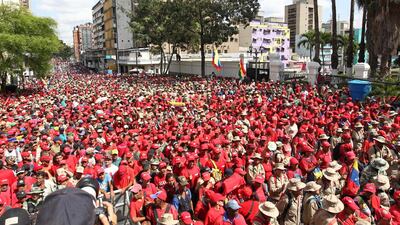 Hundreds of people participate in an official march against imperialism and sabotage of the electrical grid, in Caracas, Venezuela. EPA