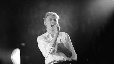 David Bowie performs at Madison Square Garden, New York in 1976. Allan Tannenbaum / Getty Images.