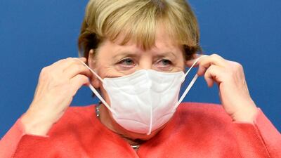 Chancellor Angela Merkel said on Friday that the drastic limits placed on people's freedoms to curb the coronavirus earlier this year had weighed heavily on her, bringing back memories of life in surveillance-riddled East Germany. EPA/JOHANNA GERON / POOL
