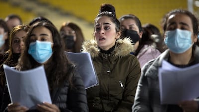 Choristers from a joint Kurdish and Christians orchestra and choir rehearse at Erbil international Stadium for the visit of Pope Francis to the capital of the Kurdistan region in Iraq. EPA