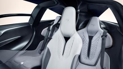 With a central driving position, and twin passenger seats positioned behind on either side, it evokes the McLaren F1. McLaren