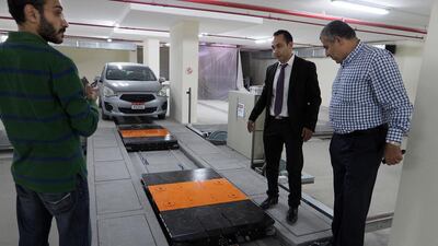 An automated car park, said to be first of its kind in the capital, has begun operation at a new residential building in the Al Zahiyah district. Delores Johnson / The National