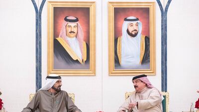 King Hamad receives Sheikh Mohammed bin Rashid at his home in Abu Dhabi on Saturday. Rashed Al Mansoori / Ministry of Presidential Affairs