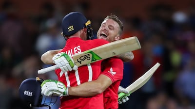England batsmen Jos Buttler (R) and Alex Hales celebrate beating India in the T20 World Cup semi-final at the Adelaide Oval on November 10, 2022. EPA