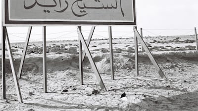 A sign reading Sheikh Zayed Road on the newly opened section of the E1 in Ras Al Khaimah in the late 1970s. Photo: Alittihad