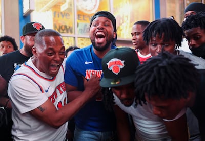 Fans celebrate as the Knicks clinch the title. Reuters