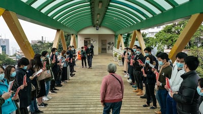 Medical workers hold a strike near Queen Mary Hospital to demand the government shut the city's border with China to reduce the spread of the coronavirus in Hong Kong, China. Getty Images