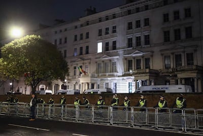 A line of police outside the Iranian embassy in west London. AFP