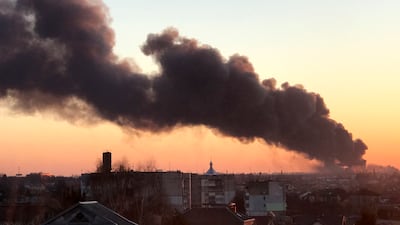 A cloud of smoke rises after an explosion in Lviv, western Ukraine, on March 18. AP