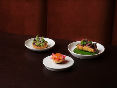 A trio of Tresind Mayfair dishes, including the reimagined pani puri, centre. Photo: Tresind