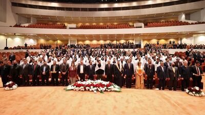 A handout picture released by Iraq's Prime Minister's Media Office on January 9, 2022 shows Iraqi lawmakers attending the inaugural session of the parliament in Baghdad, three months after legislative elections. AFP
