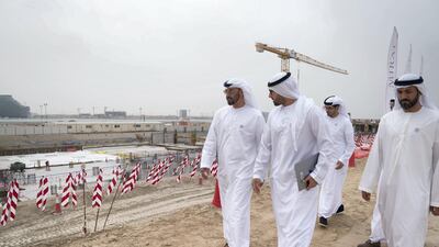 The Abu Dhabi Crown Prince walks along the development with Mohammed Al Mubarak, and Mohamed Al Mazrouei, Undersecretary of the Crown Prince Court of Abu Dhabi, right. Mohammed Al Hammadi / Crown Prince Court - Abu Dhabi