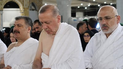 This handout image released by the Saudi press Agency (SPA) on April 29, 2022 shows Turkish President Tayyip Erdogan performing an umrah pilgrimage in the Saudi holy city of Mecca. - Erdogan has met with Saudi Arabia's crown prince to "develop" relations in his first visit since the 2018 killing of journalist Jamal Khashoggi drove a wedge between the Sunni powers. (Photo by SPA / AFP) / RESTRICTED TO EDITORIAL USE - MANDATORY CREDIT "AFP PHOTO / Saudi press Agency (SPA) / HANDOUT " - NO MARKETING - NO ADVERTISING CAMPAIGNS - DISTRIBUTED AS A SERVICE TO CLIENTS