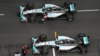 Nico Rosberg, top, and Lewis Hamilton, are fighting for the world title in the same car. Mark Thompson / Getty Images