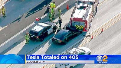 This January 22, 2018, file still frame from video provided by KCBS-TV shows a Tesla Model S electric car that has crashed into a fire engine on Interstate 405 in Culver City, California. No one was injured. AP