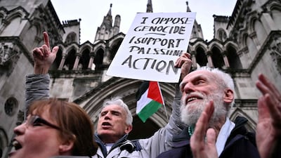 Protesters celebrate after judge Dame Victoria Sharp said the court considered the proscription of the group to be disproportionate. AFP