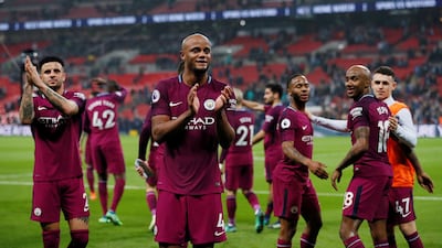 Manchester City's Vincent Kompany and teammates applaud the fans after the match against Tottenham Hotspur at Wembley, a match City won 3-1. David Klein / Reuters