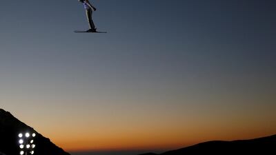 China's Qi Guangpu of China performs an aerial during training for the Snowboarding and Freestyle Skiing World Championships in Sierra Nevada, Spain. Paul Hanna / Reuters / March 9, 2017