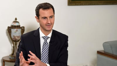 Syria's Bashar Al Assad gestures during an interview in the Syrian capital Damascus (AFP PHOTO / HO / SANA)