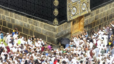 Muslim pilgrims from all around the world circle around the Kaaba at the Grand Mosque in Makkah. Ahmad Gharbali / AFP