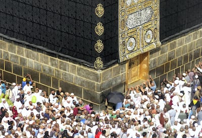 Muslim pilgrims from all around the world circle around the Kaaba at the Grand Mosque in Makkah. Ahmad Gharbali / AFP