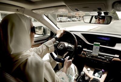 Ammal Farahat driving as a Careem captain in Saudi Arabia. AP