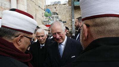 Britain's Prince Charles meets with Palestinian Muslim clerics outside Bethlehem's Omar Ben al-Khattab mosque. AFP