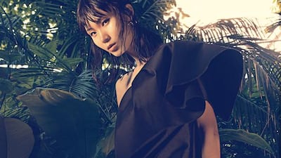 FOREST FOLK: Dress, Dh650, Iris and Ink at The Outnet. Bag, Dh9,900, Saint Laurent. Earrings, Dh940, Pave Design at Valleydez.