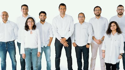 Khazna's leadership team, including co-founders Fatma El Shenawy, third left, Omar Salah, chief executive, centre, and Ahmed Wagueeh. Photo: Khazna