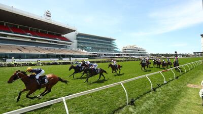 William Pike riding Outrageous wins the Grinders Coffee Roasters Trophy during 2020 Lexus Melbourne Cup Day. Getty Images for the VRC
