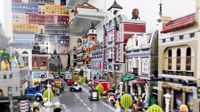 A miniature city, populated with Lego characters, cars and cafeterias, built by Philippe Gerard. The 55-year-old says he was introduced to Lego as a child, and began collecting seriously in the 1980s. Reem Mohammed / The National