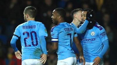 Manchester City's Raheem Sterling, second from left, celebrates with his teammates Bernardo Silva, Phil Foden and Gabriel Jesus. AP