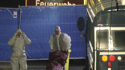 A gunman is in custody after shooting dead two US airmen and seriously wounding two others in a US Army bus at Frankfurt airport, authorities said.