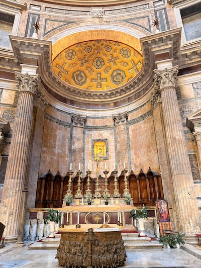The Pantheon’s ornate altar, framed by towering marble columns and a gilded apse. Vanessa Ghanem / The National