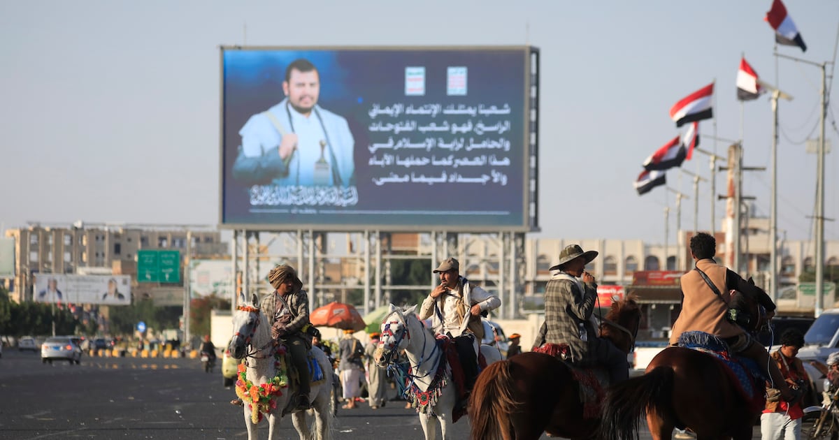 Photo: The National A digital billboard featuring Houthi leader Abdul-Malik Al Houthi in Sanaa, Yemen. Houthi attacks and threats against