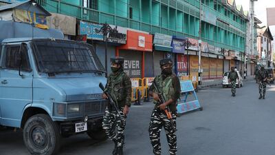 Indian paramilitary soldiers patrol near a closed market in Srinagar, the summer capital of Indian-controlled Kashmir, after the death of Syed Ali Geelani. EPA