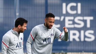 Neymar and Lionel Messi during PSG's training at the club's Camp des Loges training ground. AFP
