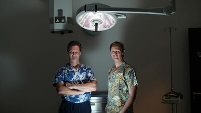 Dr Maurizio Viel, left, and Dr Roberto Viel of the London Centre for Aesthetic Surgery in Dubai say selfies are driving millennials to have plastic surgery in an attempt to boost their image on social media sites. Amy Leang