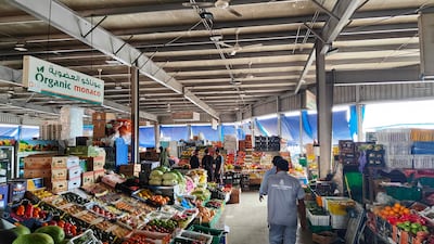 Traders at the fruit and vegetable market at Mina Zayed are dealing with supply disruption owing to the Iran war. Alexander Christou / The National
